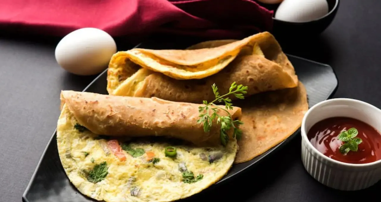 Kolkata Style Egg Roll: ময়দা বেলার পর এই কৌশলেই তৈরি হবে দোকানের মতো এগরোল! নরম পরোটা, কুড়মুড়ে প্রান্ত আর জিভে জল আনা পুর
