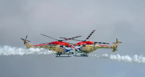 Varanasi Air Show 2026: नमो घाट पर सारंग टीम के पांच ध्रुव हेलीकॉप्टर दिखाएंगे हवाई करतब, 22 से 25 अक्टूबर तक आयोजन
